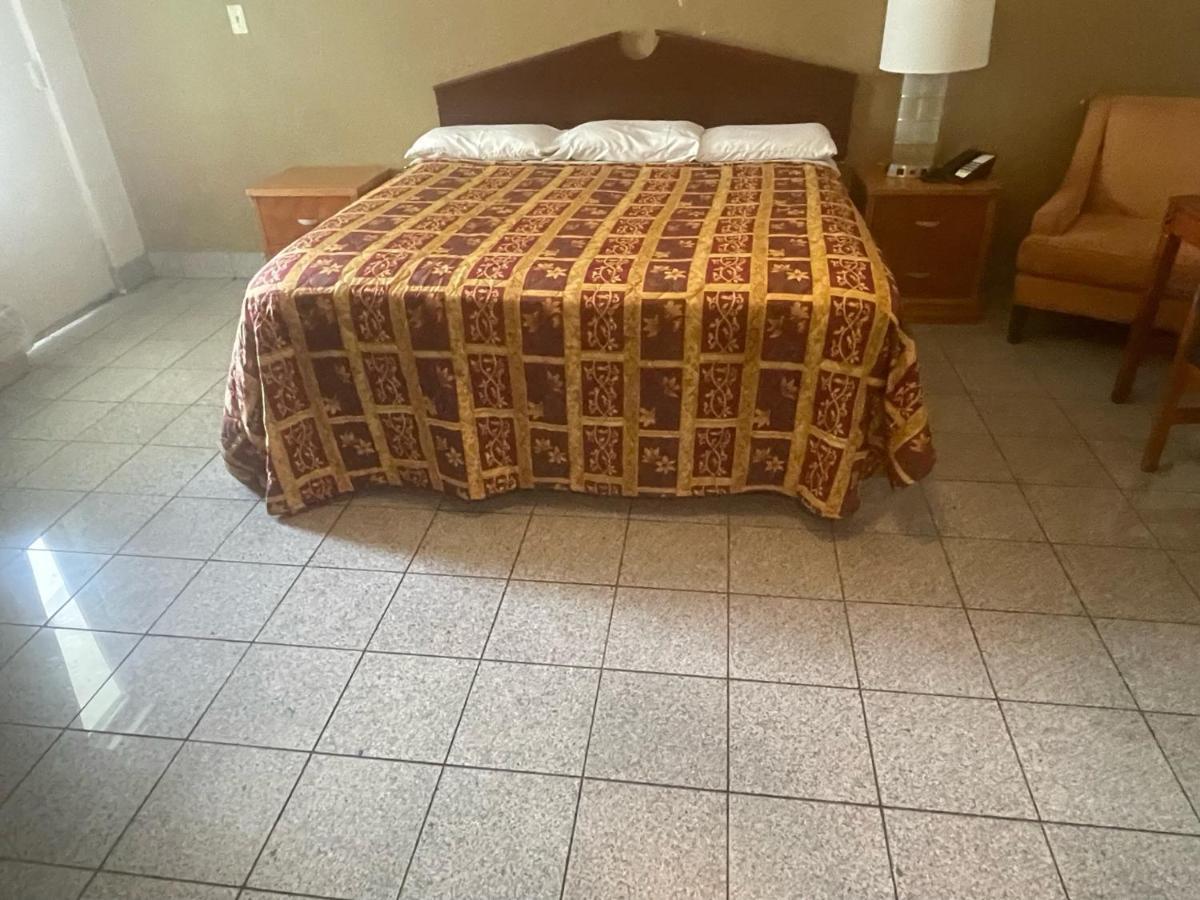 Budgetel Inn And Suites - Луїсвілл Екстер'єр фото